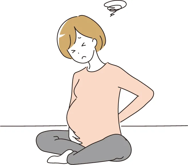 妊娠中に腰へ負担を感じている妊婦のイラスト